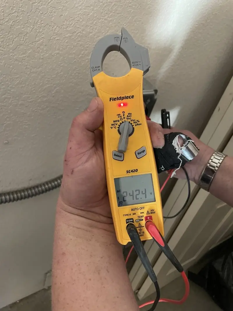 Voltage testing with clamp meter during Hot Tub / Pool Electrical Wiring in Woodward